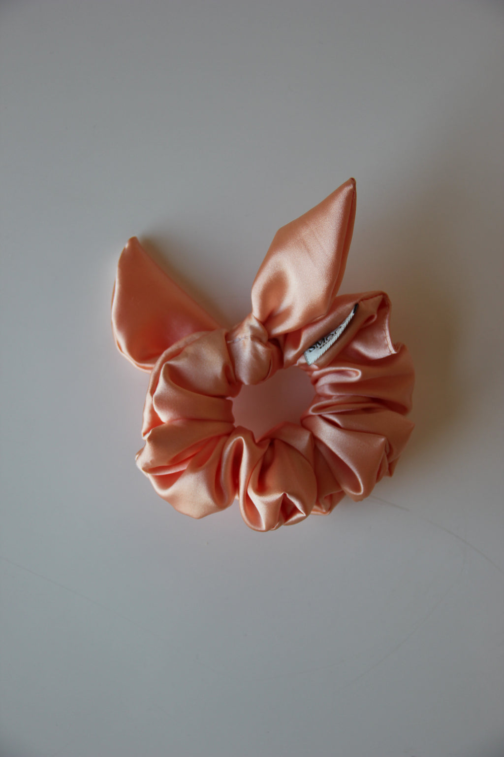 O scrunchie de coelhinho